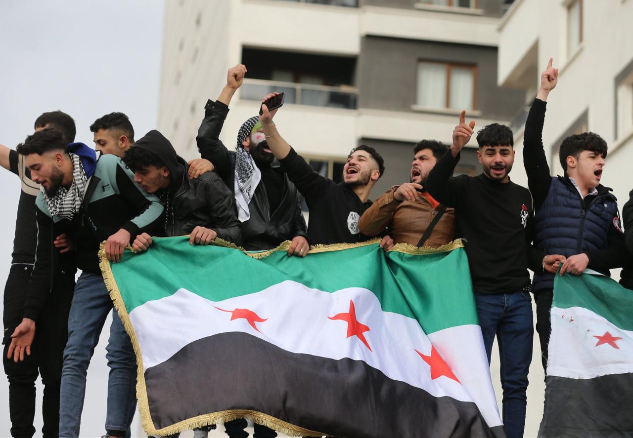 Syrian refugees celebrate the fall of the Assad regime, in the capital Ankara, Türkiye, Dec. 8, 2024. (EPA Photo)
