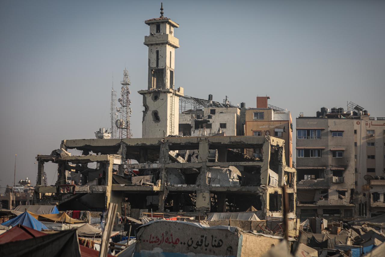 Palestinians live amid the rubble of buildings destroyed in Israeli attacks, following the ceasefire and the withdrawal of Israeli forces, in the Shujaiya neighborhood, eastern Gaza City, Gaza on Nov. 10, 2025. (AA Photo)