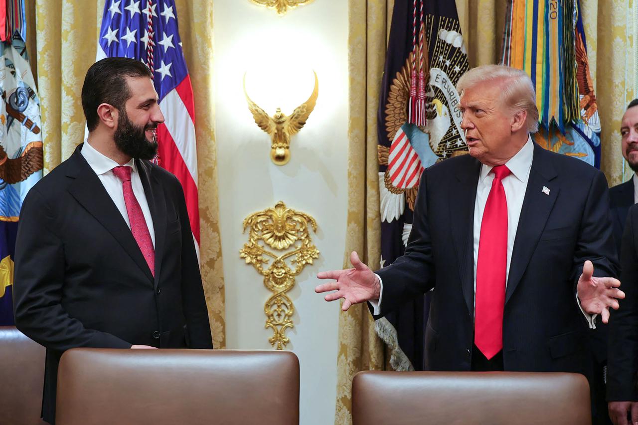 This handout photograph released by the official Syrian Arab News Agency (SANA) shows Syrias President Ahmed al-Sharaa (L) meeting with U.S. President Donald Trump at the White House in Washington, US on November 10, 2025. (SANA HO / AFP Photo)
