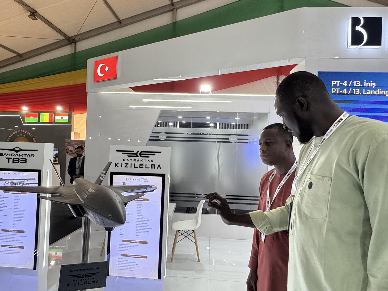 Visitors visit the Turkish defense industry companies such as Baykar, Roketsan, which are taking part in the Bamako Expo Fair (BAMEX’25) under the leadership of the Presidency of Defense Industries, are examining weapons and other defense industry products at the Bamako Fair and Exhibition Center in Bamako, Mali, on Nov. 11, 2025. (AA Photo)