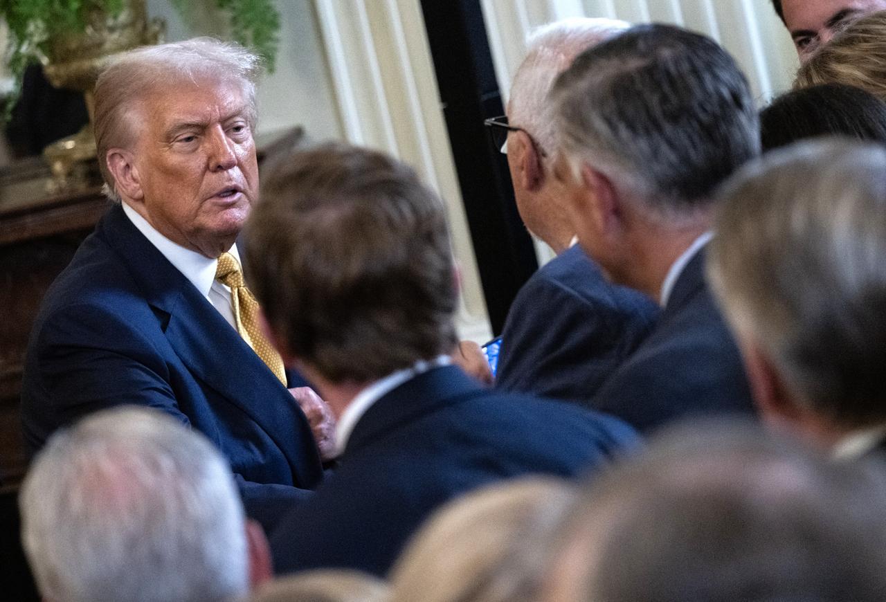 U.S. President Donald Trump chats with attendees at the end of a reception with Republican members of Congress at the White House in Washington, U.S., July 22, 2025. (AFP Photo)