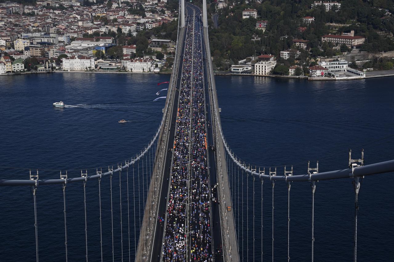 An aerial view of runners taking part in the 47th Istanbul Marathon, organized by Spor Istanbul under the slogan “The World’s Only Intercontinental Marathon,” after the race kicked off at 9 a.m. near the metrobus stop by the July 15 Martyrs Bridge on the Asian side in Istanbul, Türkiye, Nov. 2, 2025. (AA Photo)