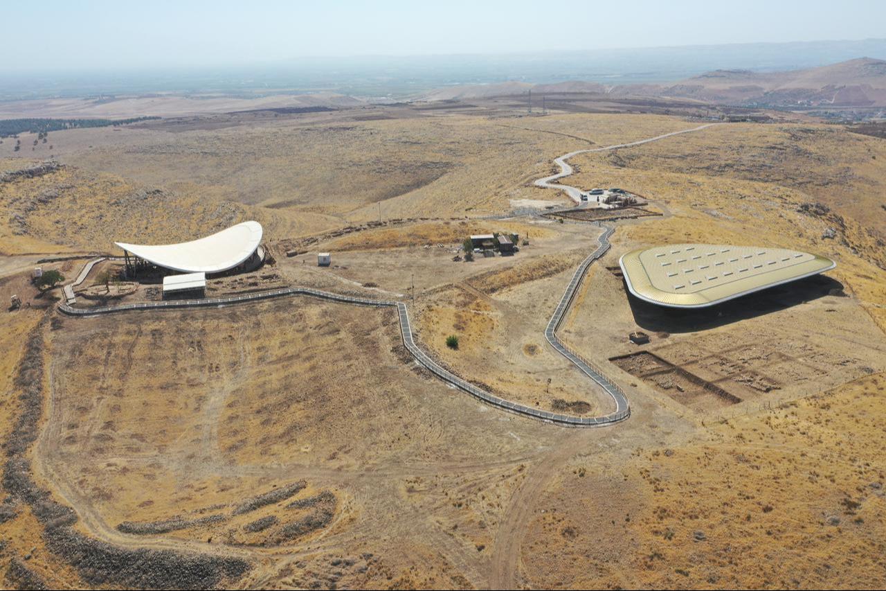 Gobeklitepe’s twin excavation shelters seen from above — the white-roofed structure (left) marks the first excavation area (GT1), while the green-roofed complex (right) covers the second site (GT2), which is preparing to open to visitors in Sanliurfa, Türkiye, Oct. 23, 2025. (AA Photo)