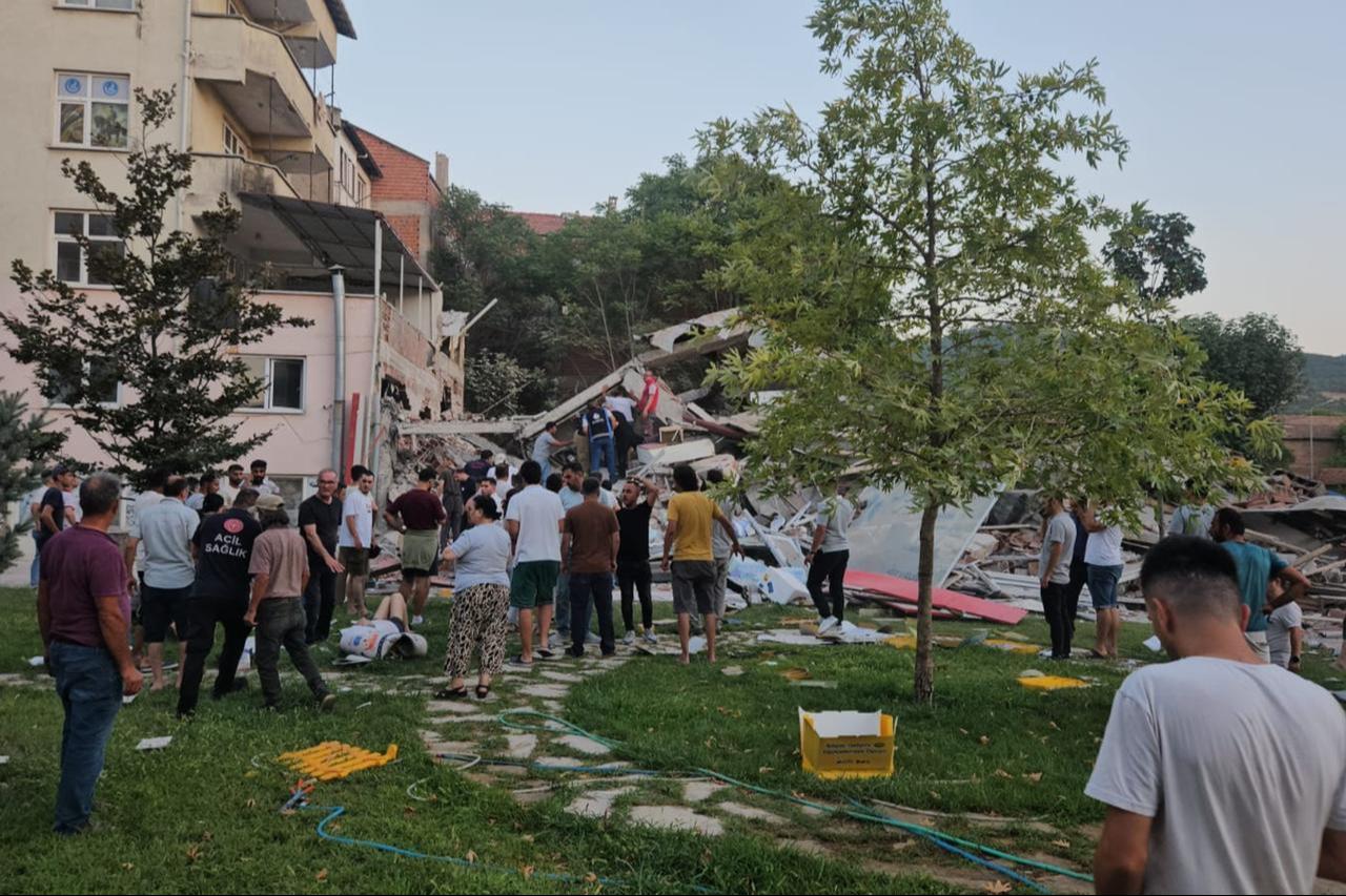 Search and rescue teams conduct operation on a collapsed building after a 6.1-magnitude earthquake struck with its epicenter in the Sindirgi district of Balikesir, Türkiye on August 10, 2025. (AA Photo)
