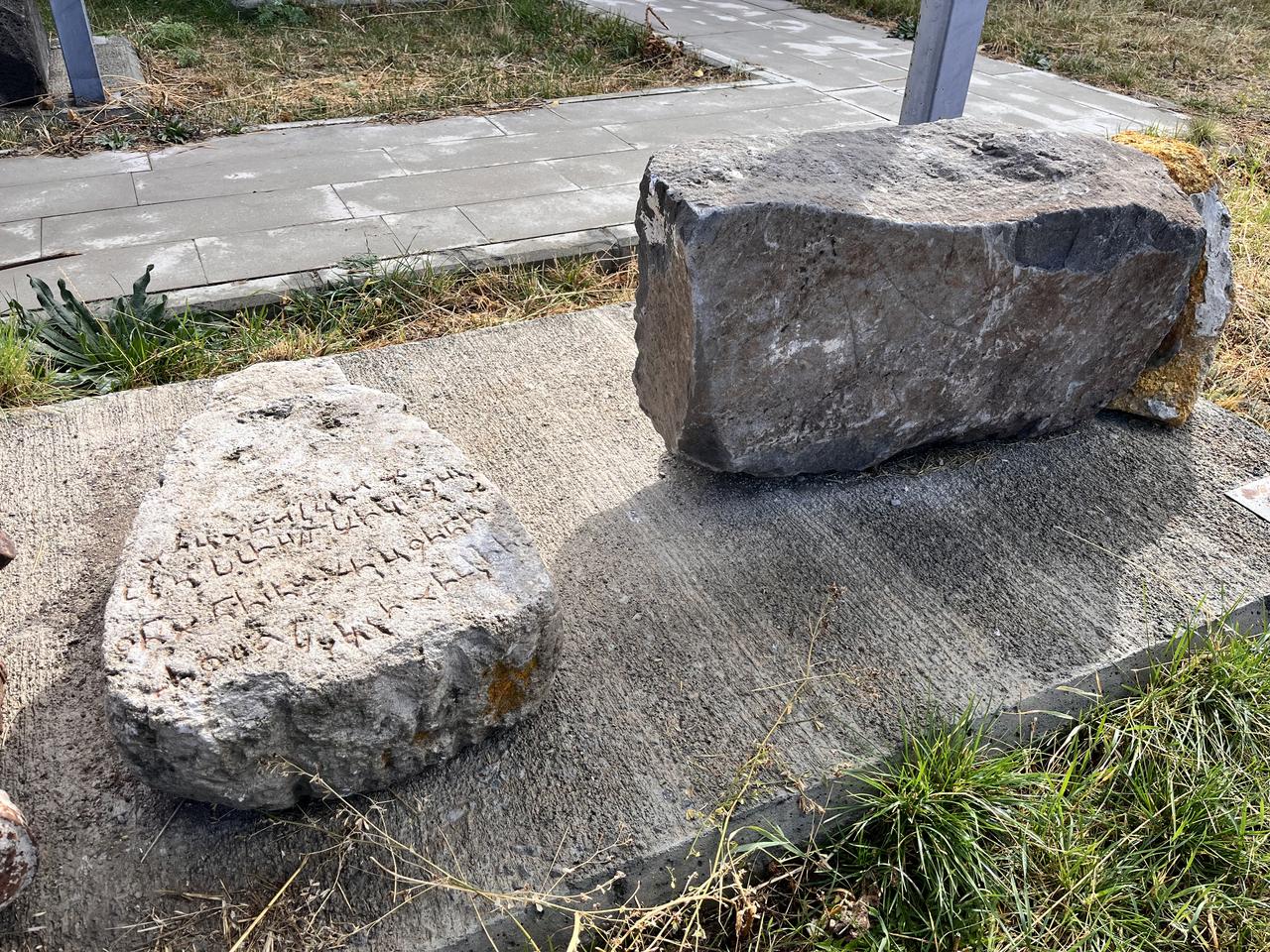 An Aramaic-inscribed stone displayed in the courtyard of the Kars Archaeology and Ethnography Museum in Kars, Türkiye, Nov. 17, 2025. (AA Photo)