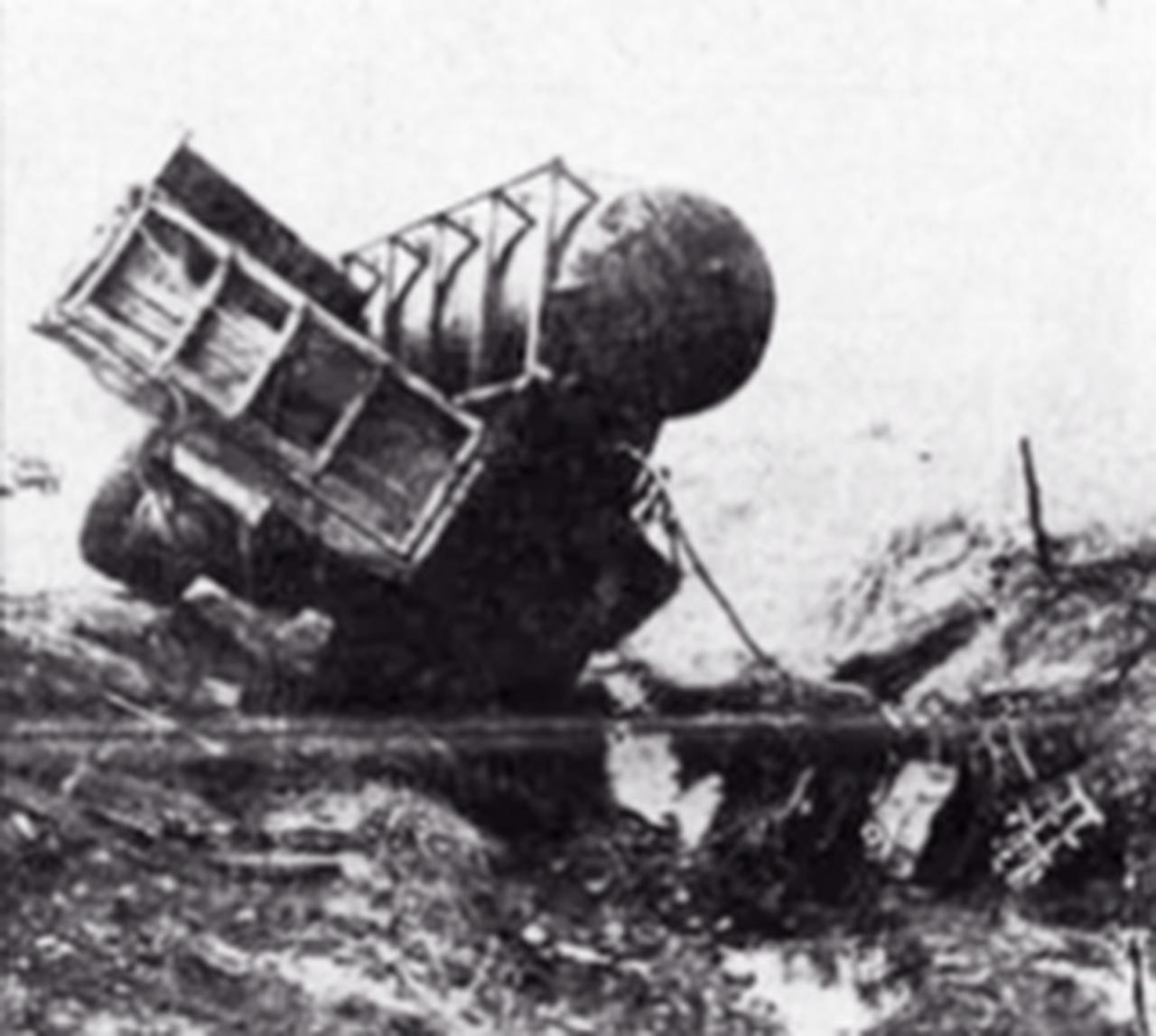 The tanker carrying nitric acid lies overturned in a roadside ditch after the collision, showing the point where the chemical spilled onto the ground and into water. (Photo via Hurriyet daily)