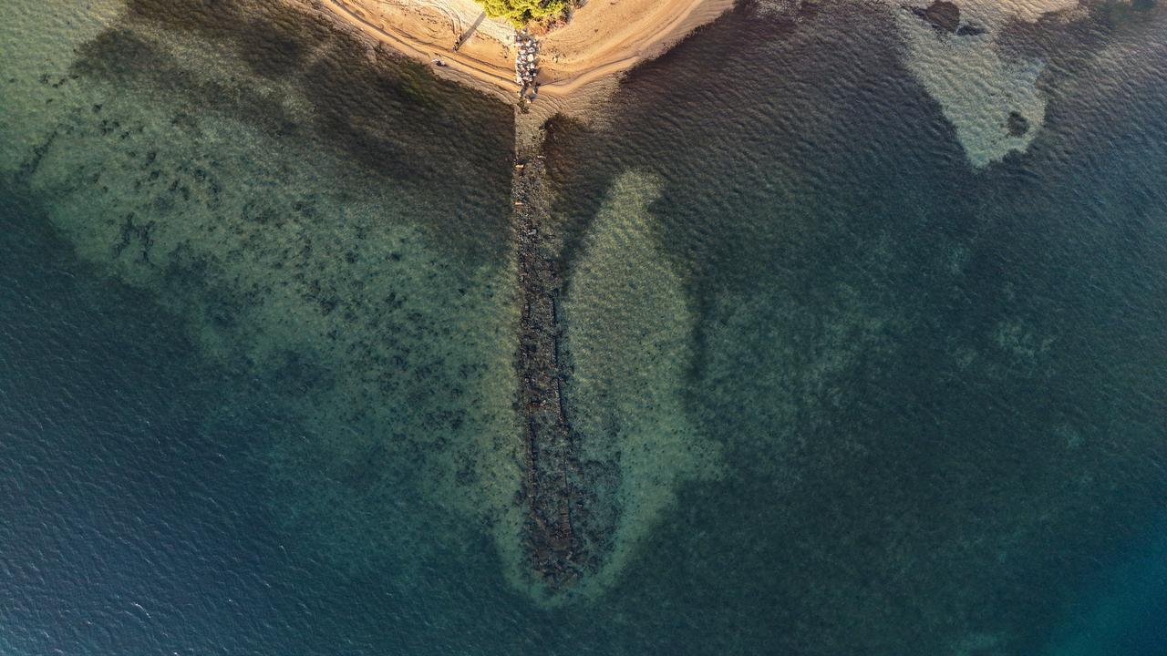 A drone image captures the outline of submerged stone remains revealed by a significant drop in sea level off the Duzler coast in Erdek, Balikesir, northwest Türkiye, Nov. 17, 2025. (IHA Photo)