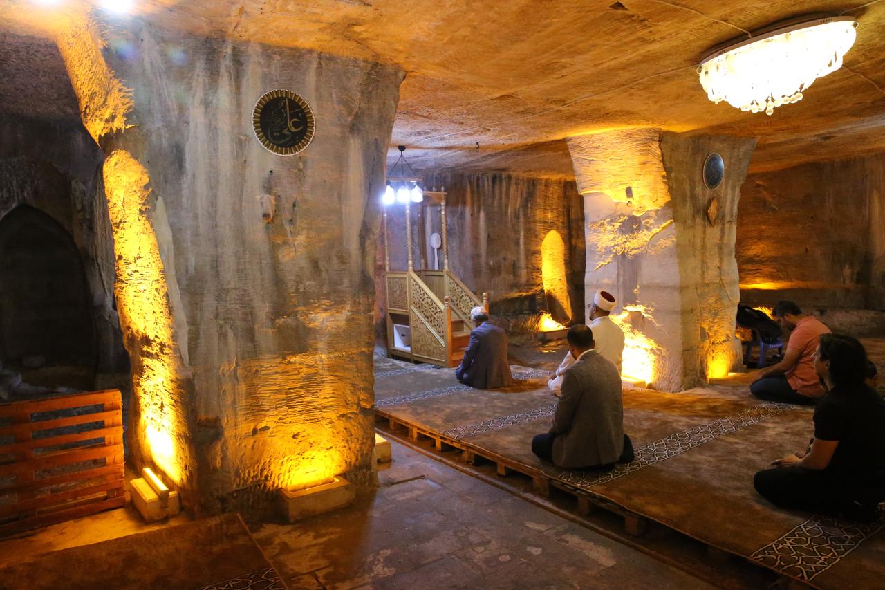 Rock carved Cave Mosque in Sanliurfa welcomes visitors again after decades of silence