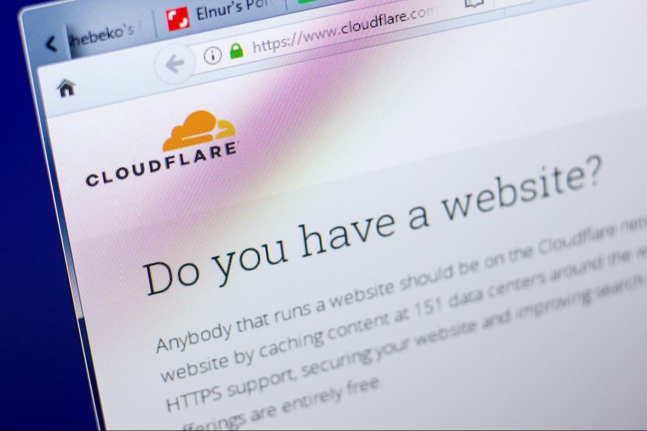 A computer screen displays the homepage of internet infrastructure provider Cloudflare. (Adobe Stock Photo)