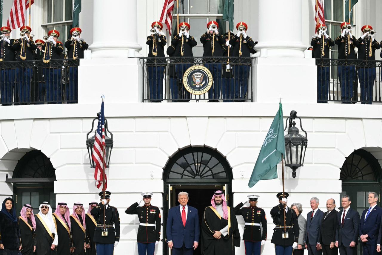 US President Donald Trump greets Crown Prince and Prime Minister of the Kingdom of Saudi Arabia Mohammed bin Salman on the South Lawn at the White House in Washington, DC on Nov. 18, 2025. (AFP Photo)