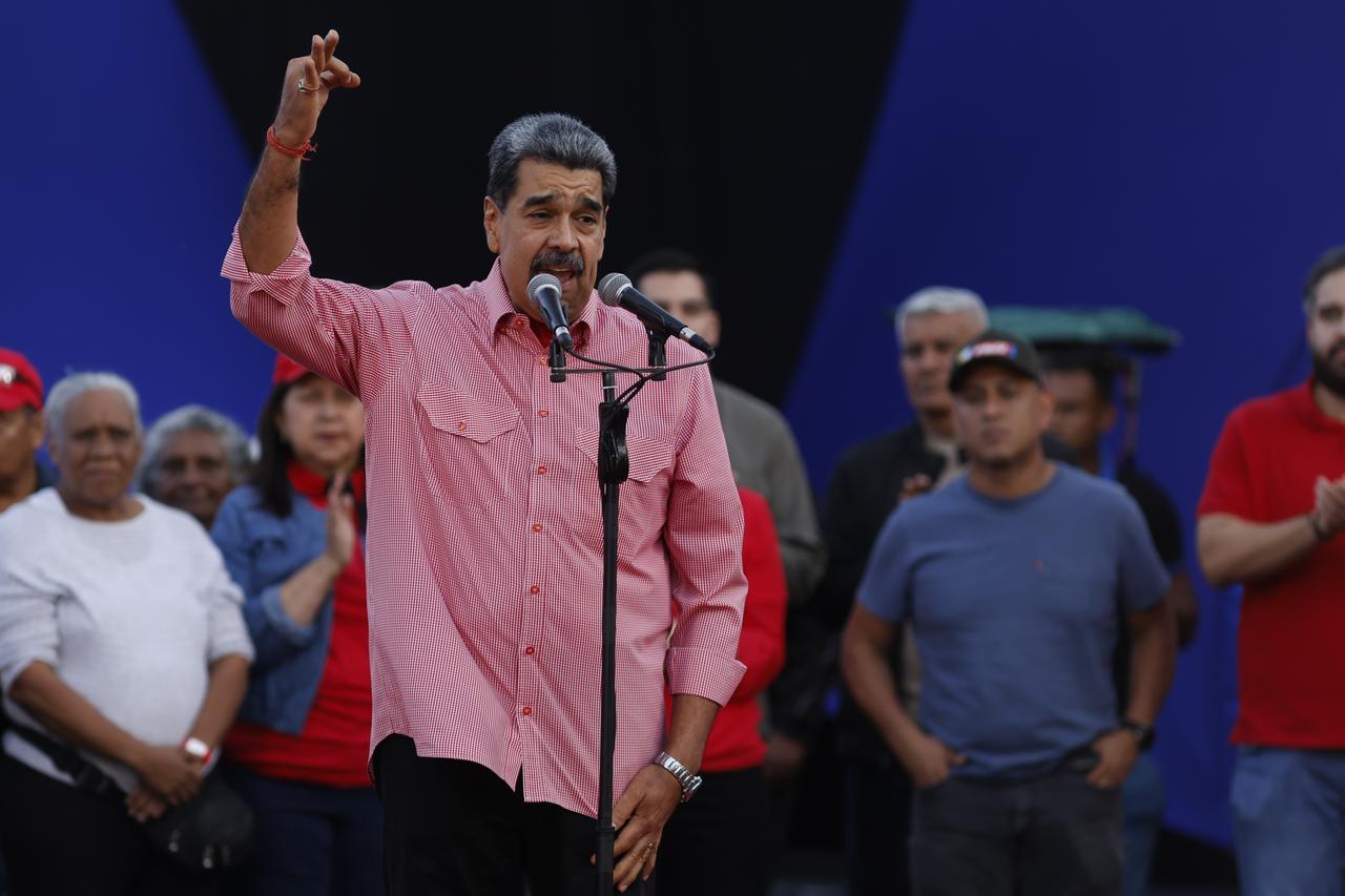 Venezuelan President Nicolás Maduro speaks during a march to swear in the Bolivarian Integral Base Committees in Caracas, Venezuela, on Nov. 15, 2025. (AA Photo)
