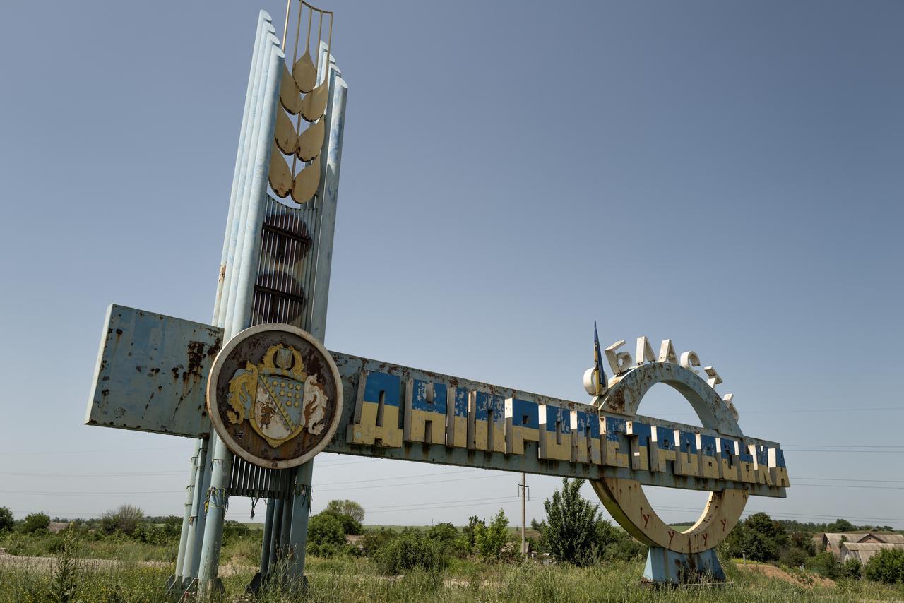 This photograph shows a road sign marking the entrance to the Dnipropetrovsk region, installed on the border between the Dnipropetrovsk and Donetsk regions at an undisclosed location on June 8, 2025. (AFP Photo)