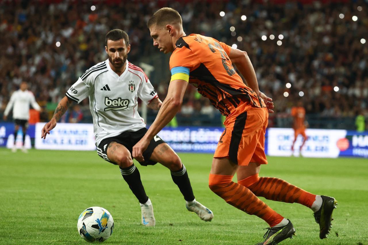 Rafa Silva of Besiktas in action against Mykola Mytvienko of Shakhtar Donetsk during the UEFA Europa League second qualifying round match between Shakhtar Donetsk and Besiktas at Henryk Reyman Municipal Stadium in Krakow, Poland on July 31, 2025. ( AA Photo)