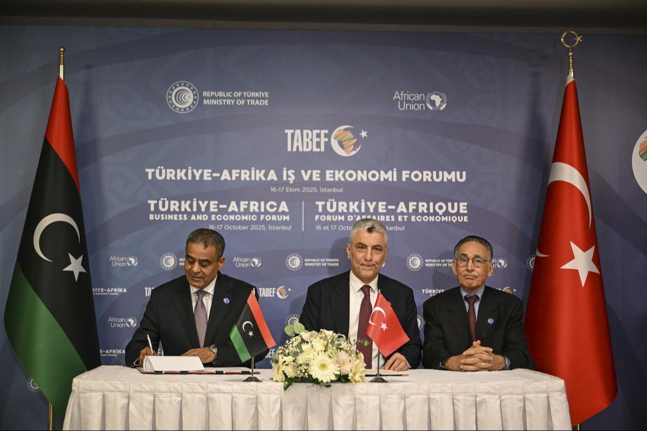 Turkish Trade Minister Omer Bolat (C) attends the signing ceremony with Libyan Economy and Trade Minister Muhammad al-Huwayj (L) and Libyan Transport Minister Muhammad Salem Al-Shahoubi during the 5th Türkiye-Africa Business and Economic Forum in Istanbul, Türkiye, Oct. 16, 2025. (AA Photo)