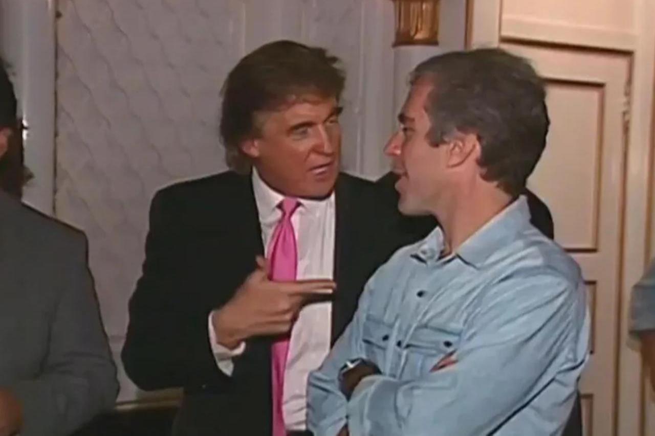 Then-businessman Donald Trump speaks with Jeffrey Epstein at a party in Palm Beach, Florida, in Nov. 1992. (Photo via MSNBC)
