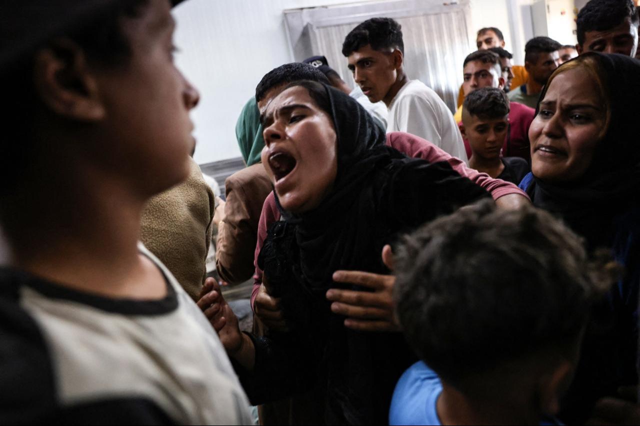 A Palestinian woman who lost members of her family in an Israeli strike reacts upon seeing their bodies at the Nasser hospital in Khan Yunis in the southern Gaza Strip on November 3, 2024. (AFP Photo)