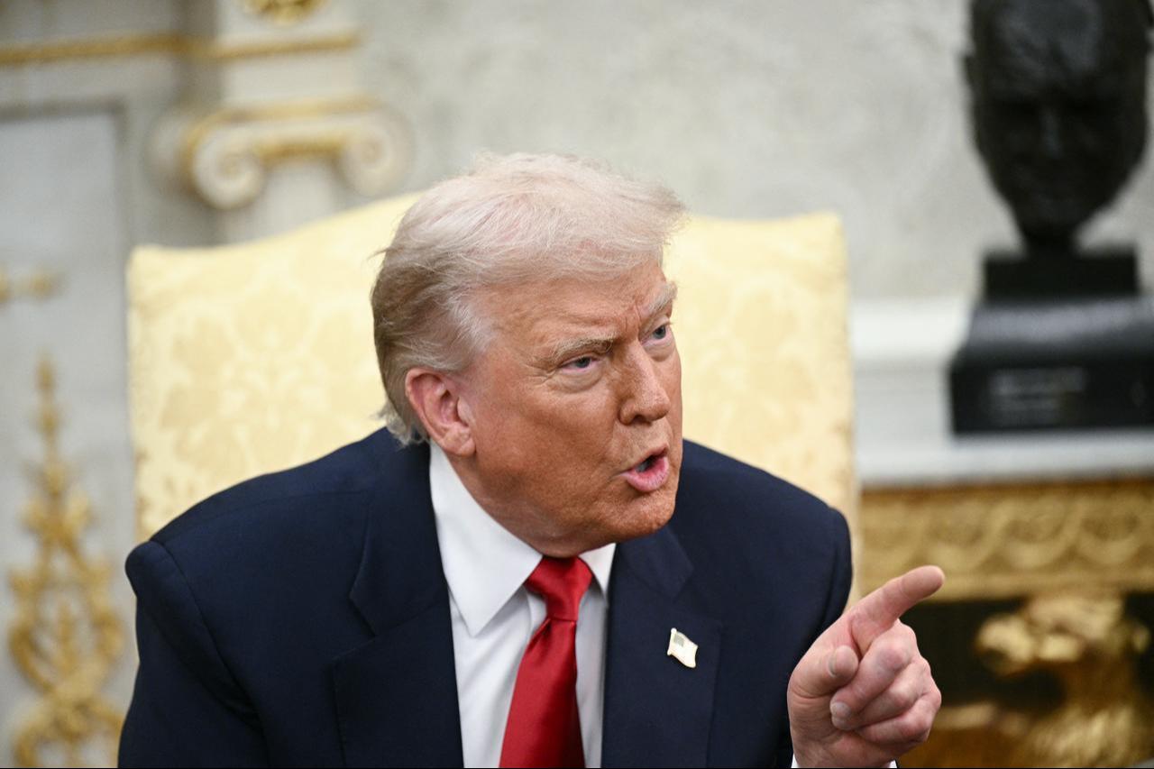 US President Donald Trump takes questions from the press in the Oval Office of the White House in Washington, DC, November 18, 2025. (AFP Photo)