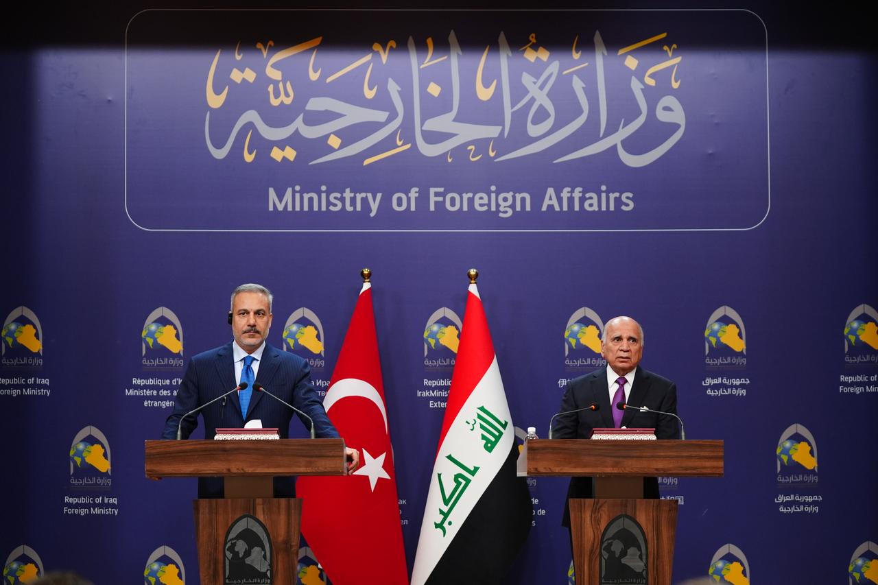 Turkish Minister Hakan Fidan (L) holds a press conference with his Iraqi counterpart Fuad Hussein (R) within his official visit in Baghdad, Iraq on Nov. 02, 2025. (AA Photo)