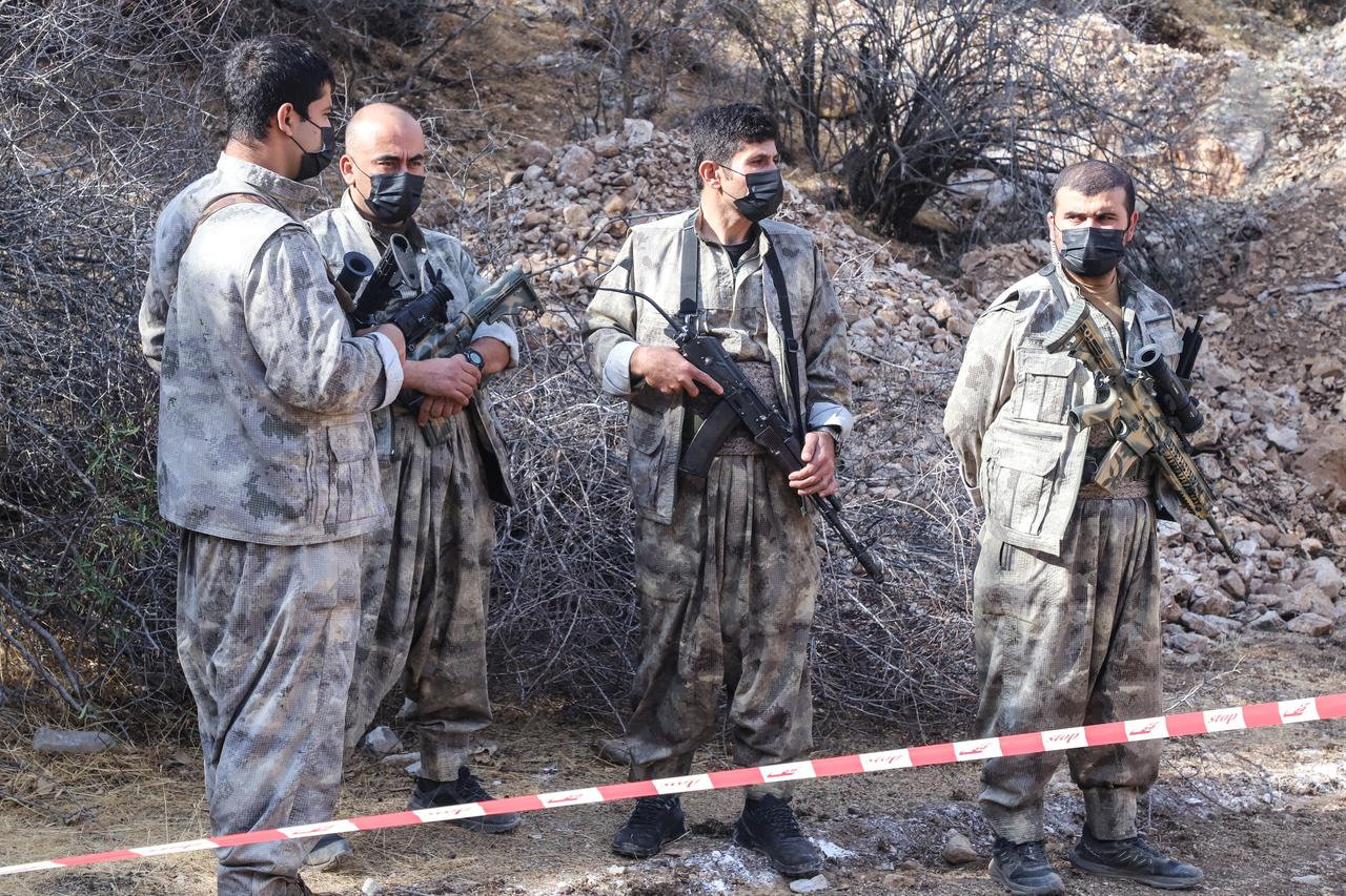 Terrorist organization PKK members attend a ceremony in Qandil area of northern Iraq, where group announced its complete withdrawal of forces from Türkiye, on October 26, 2025. (AFP Photo)