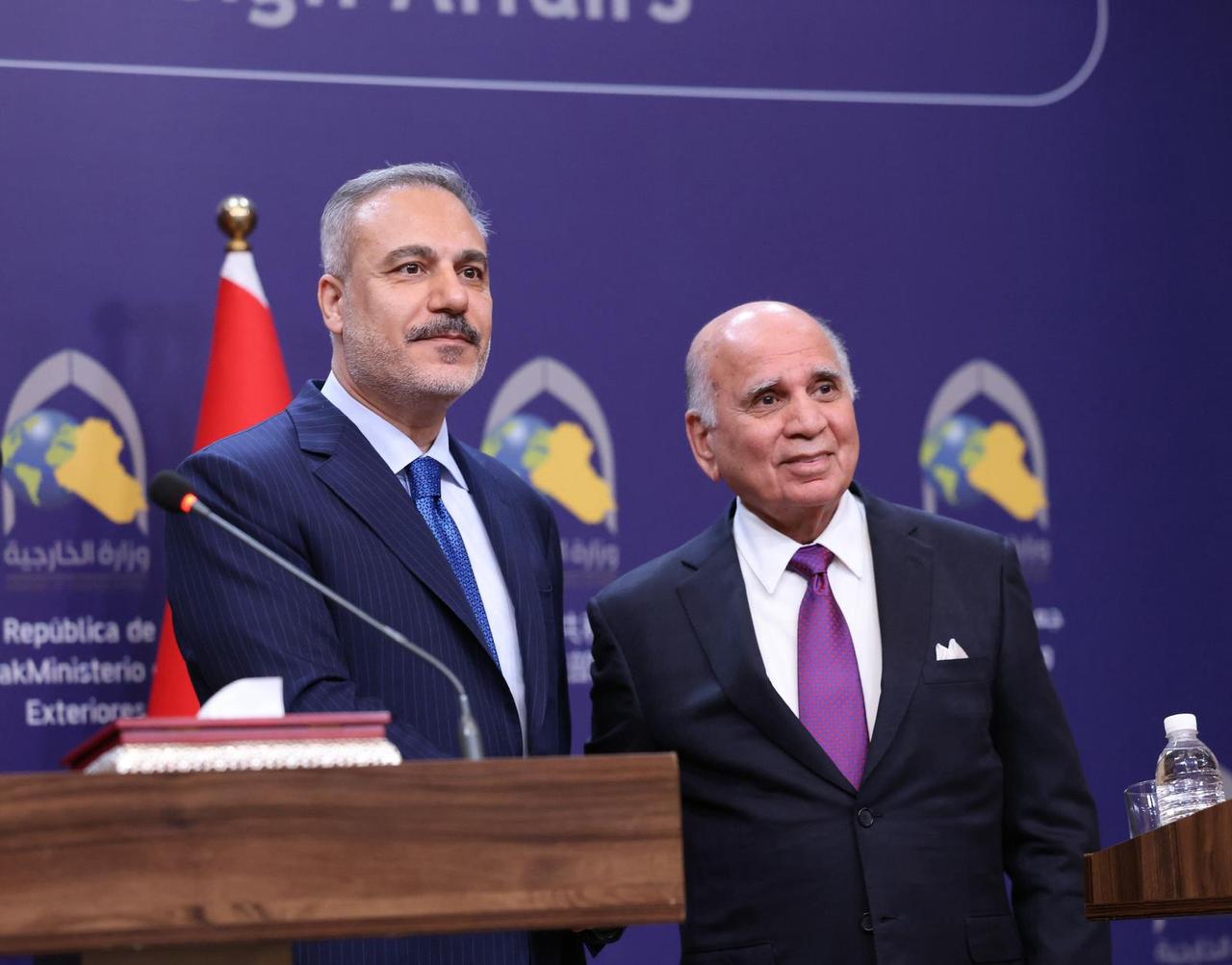 Foreign Minister Hakan Fidan (L) and his Iraqi counterpart Fuad Hussein (R) during a news conference following their talks in Baghdad, Iraq on Nov. 2, 2025. (Photo via Turkish Foreign Ministry/Handout)