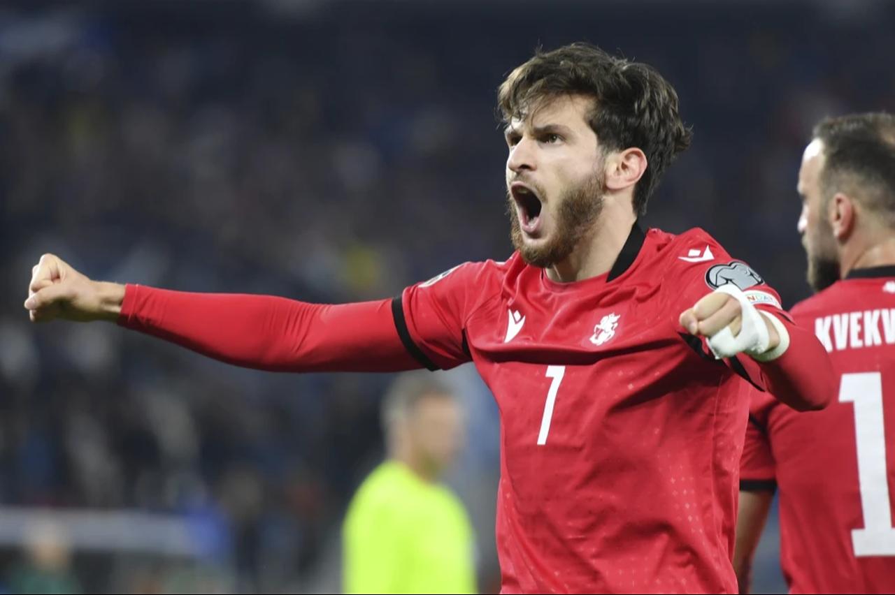 Georgia’s Khvicha Kvaratskhelia, right, celebrates after scoring his side’s second goal during the Euro 2024 group A qualifying soccer match between Georgia and Scotland at the Boris Paichadze National Stadium in Tbilisi, Georgia, Nov. 16, 2023. (Photo via newshub.ge)
