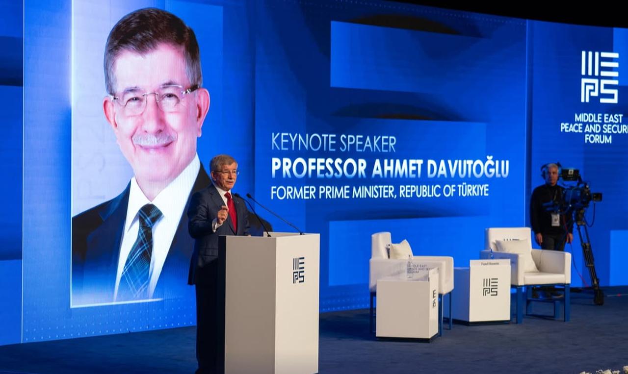 The image shows Professor Ahmet Davutoglu, the former Prime Minister of the Republic of Türkiye, as a keynote speaker at MEPS 2025. (Photo via AUK)