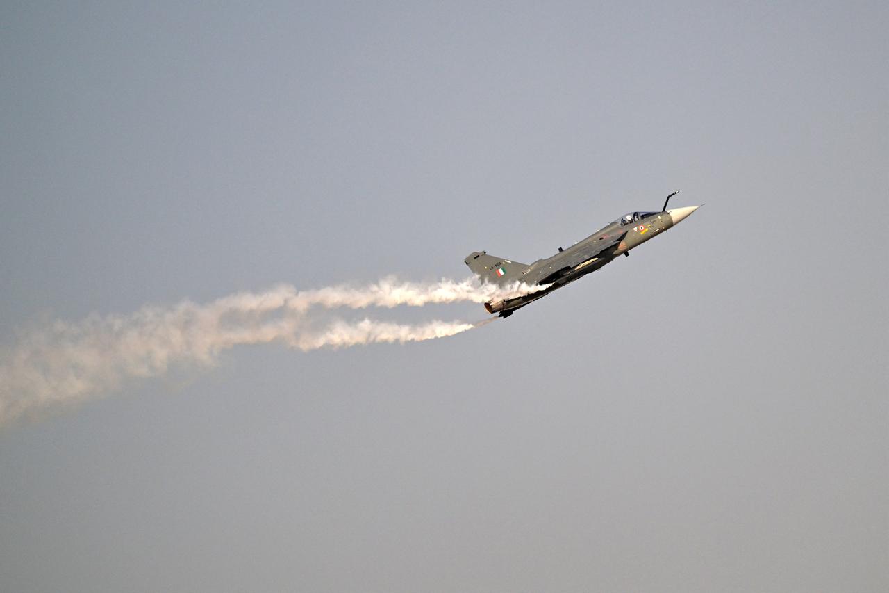 Indian Air Force's HAL Tejas performs is performing a display flight at Al-Maktoum International Airport during the Dubai Airshow 2025 in Dubai on Nov. 20, 2025. (AFP Photo)