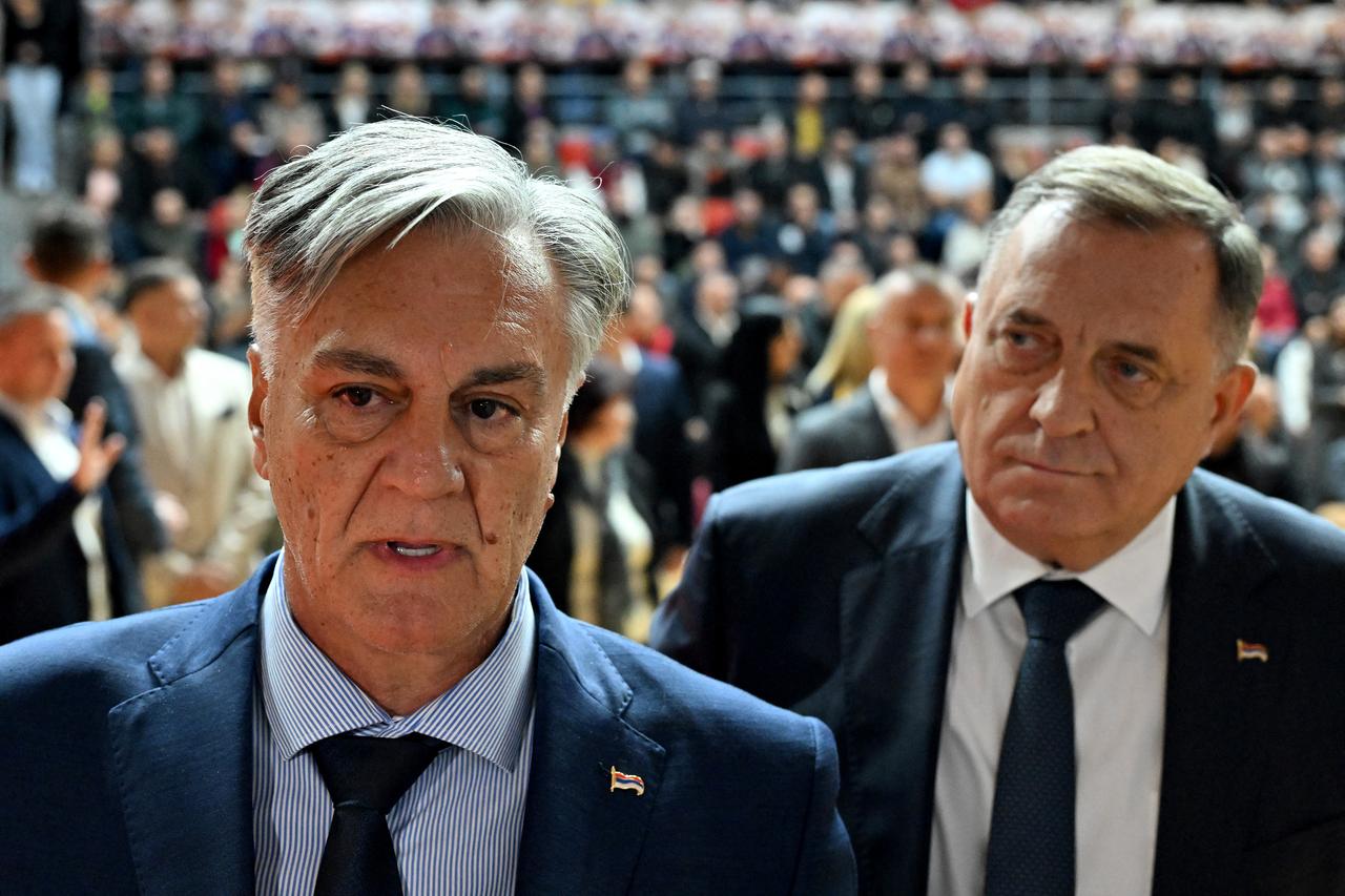 Photo shows Milorad Dodik (R), former president of Republika Srpska and leader of the SNSD party (Alliance of Independent Social Democrats), and presidential candidate Sinisa Karan (L) attending a pre-election rally in the town of Foca in eastern Bosnia and Herzegovina, on November 13, 2025. (AFP Photo)