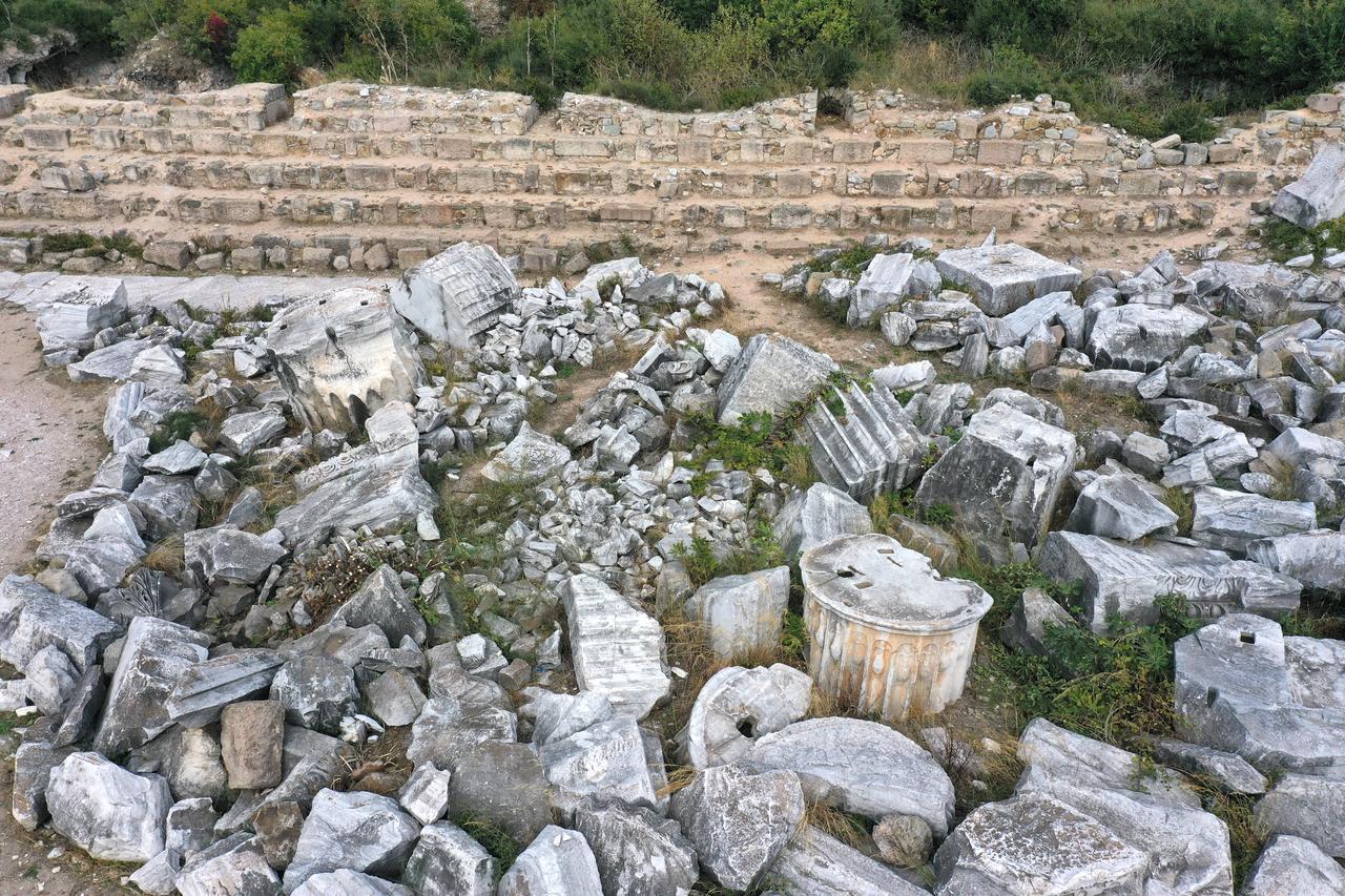 Ancient architectural blocks, column drums and decorated fragments lie scattered across the excavation zone of the Hadrian Temple in the ancient city of Cyzicus, Balikesir, Türkiye, Nov. 2025. (AA Photo)
