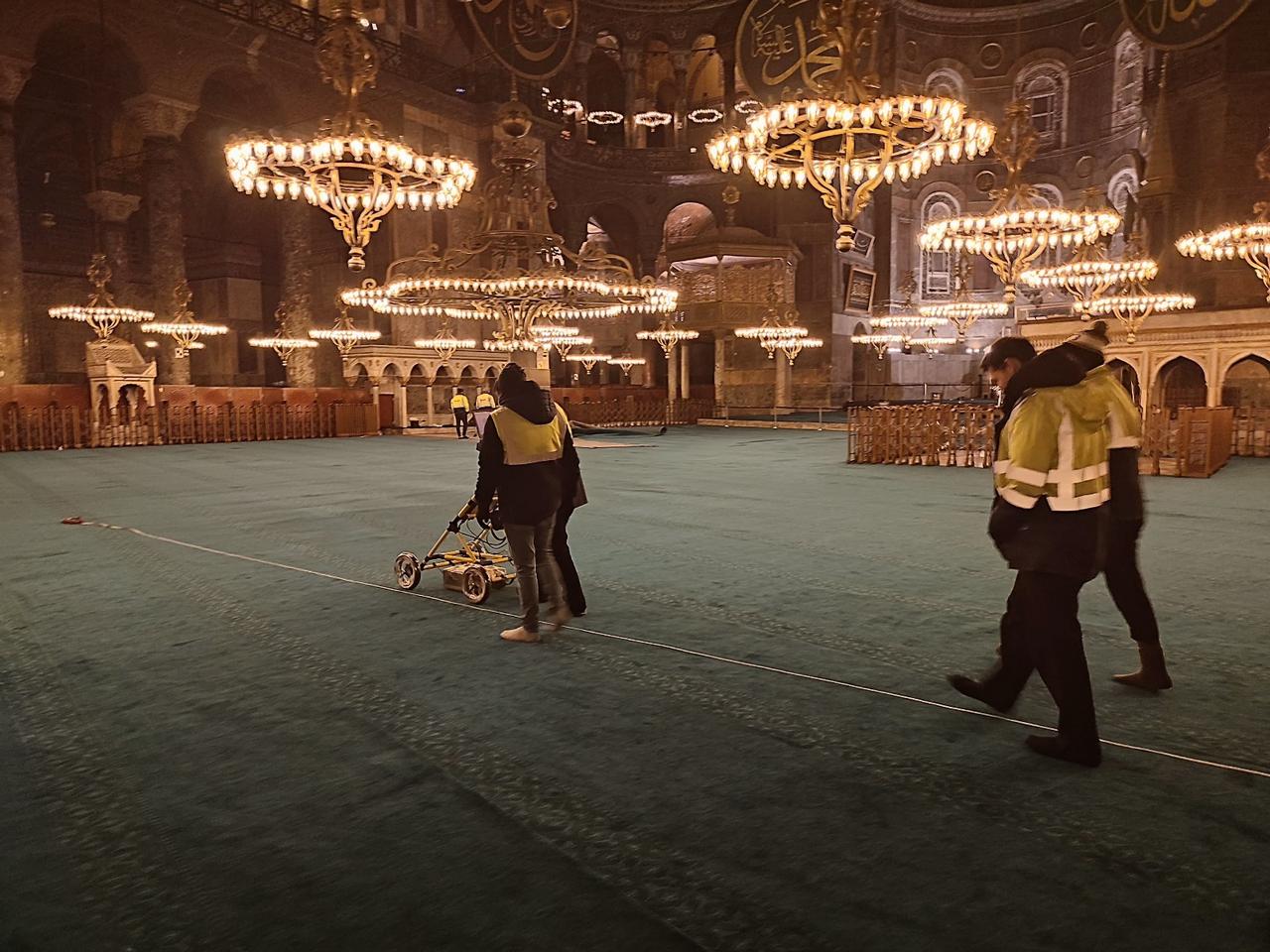 Restoration teams conduct georadar scans across the prayer hall floor to determine structural voids and layer composition before installing the temporary protection system, Hagia Sophia Grand Mosque, Istanbul, Türkiye. (Photo courtesy of Ministry of Culture and Tourism)