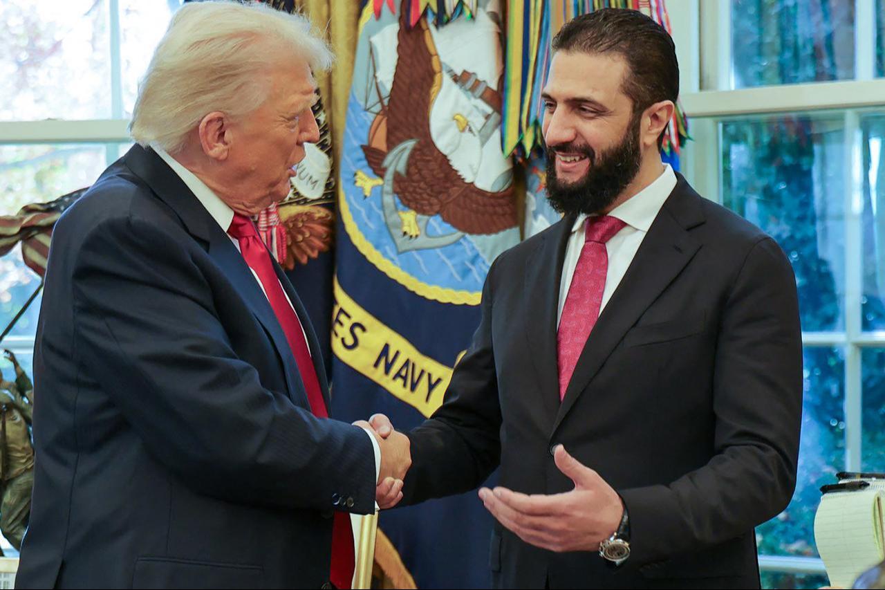 US President Donald Trump shaking hands with Syrias President Ahmed al-Sharaa at the White House in Washington DC. Syrias President Ahmed al-Sharaa met US President Donald Trump at the White House on November 10, 2025 . ( AA Photo )