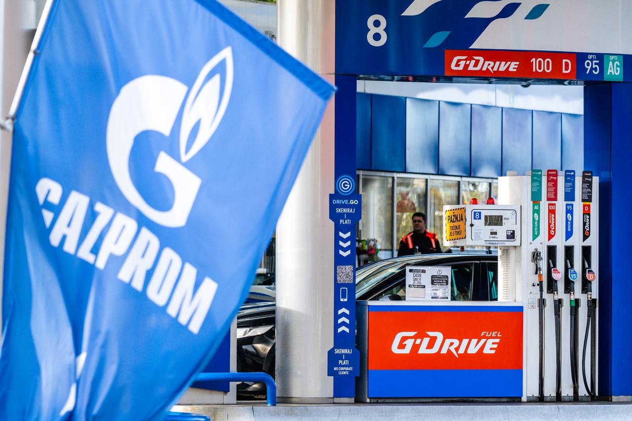 This photograph shows a car fueling up at a Gazprom gas station powered by the Naftna Industrija Srbije - NIS (Petroleum Industry of Serbia) near the company's headquarters in Belgrade on Nov. 25, 2025. (AFP Photo)