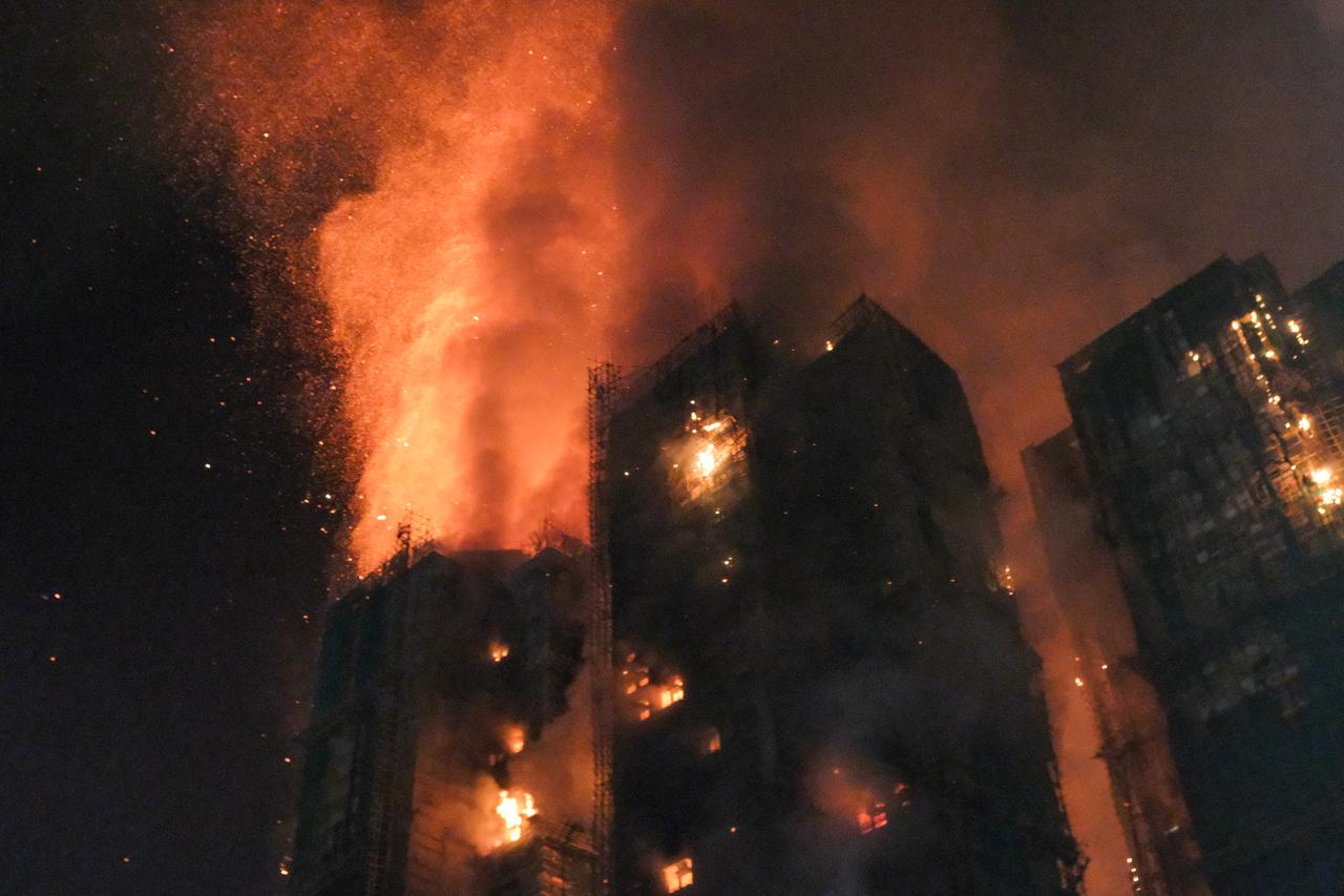 More than 700 firefighters battle Hong Kong apartment fire that killed 36