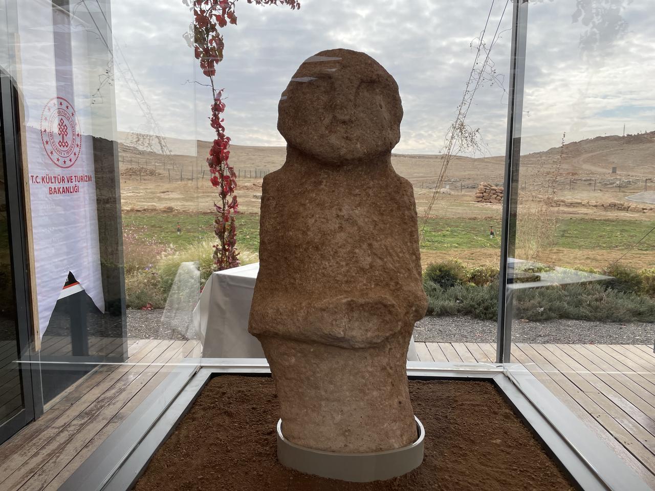 A human statue uncovered within the wall of Enclosure D at Gobeklitepe, believed to have been placed as a ritual offering during the Neolithic period. (Photo by Koray Erdogan/Türkiye Today)
