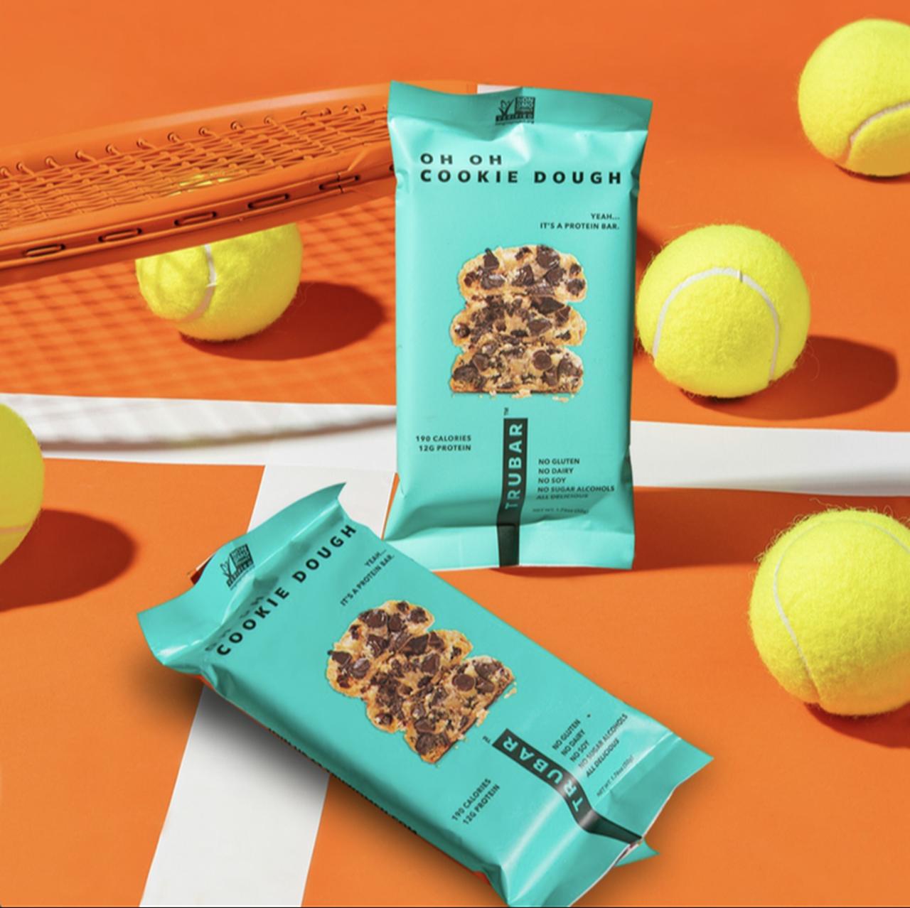 Promotional photo features Trubar’s “Oh Oh Cookie Dough” protein bars. (Photo via trubarinc.com)