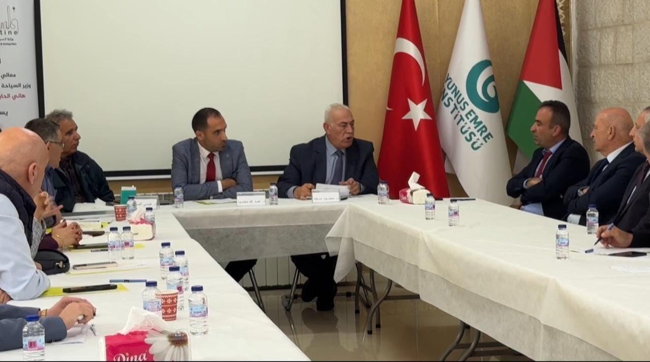 Palestinian Tourism Minister Hani al-Hayik, Türkiye's Consul General in Jerusalem Ismail Cobanoglu, and many Palestinian researchers attend the “Palestinian Culture in the Ottoman Era” panel organized by the Yunus Emre Institute in Ramallah, November 2025. (AA Photo)