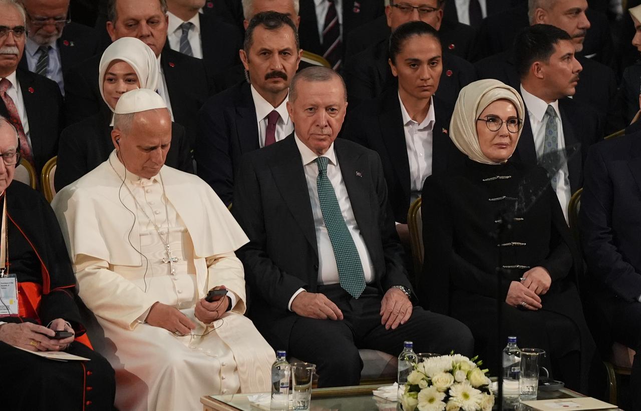 Turkish President Recep Tayyip Erdogan (C) his wife Emine Erdogan (R) and Pope Leo XIV (L) attend the Civil Society and Diplomatic Delegation Meeting at the Nation's Library of the Presidency during Pope Leo's first official trip in Ankara, Türkiye on Nov. 27, 2025. (AA Photo)
