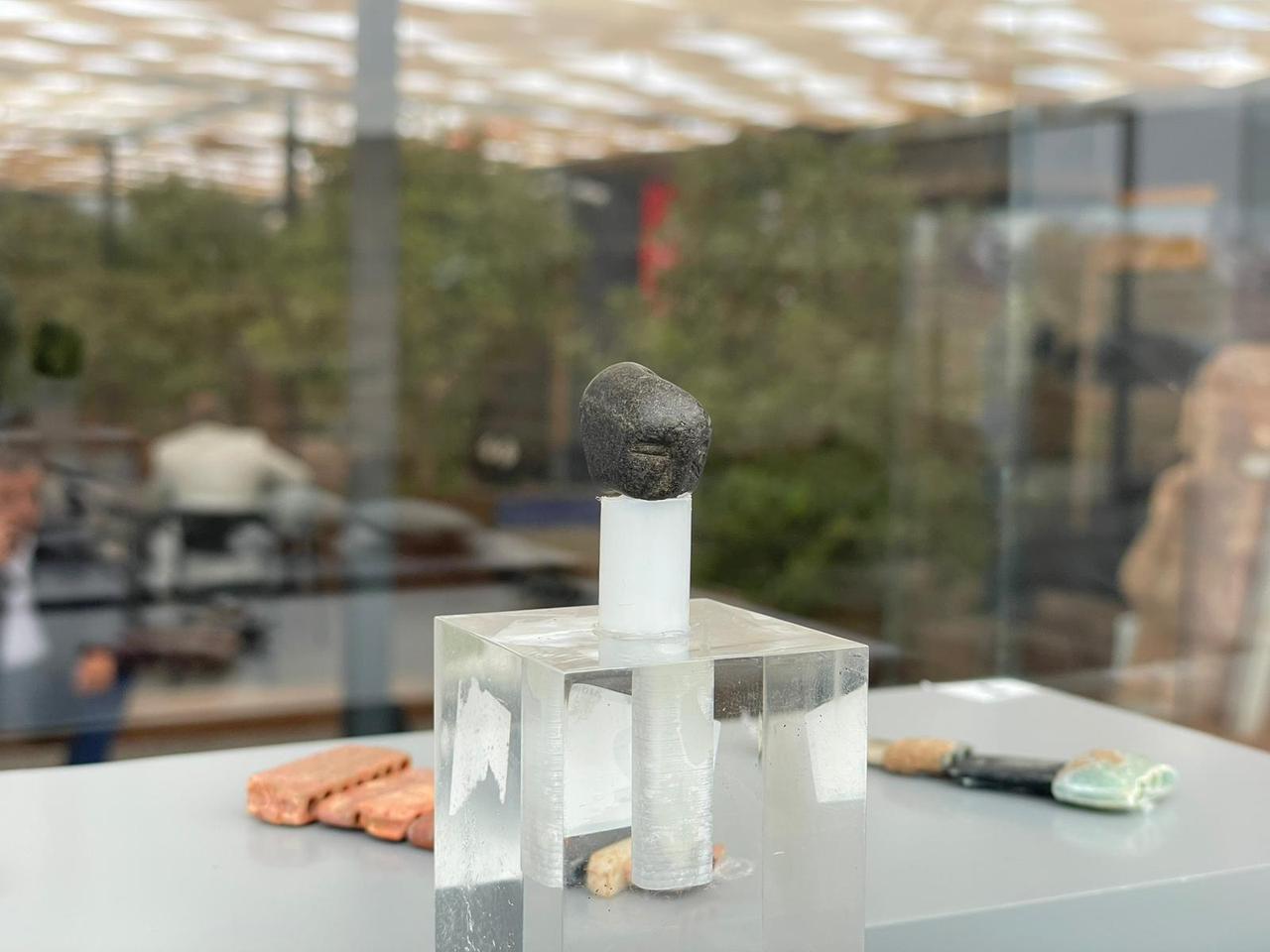 Double-faced basalt bead from Sefertepe, dating to the Pre-Pottery Neolithic period, displayed during the 2025 excavation season. (Photo by Koray Erdogan/Türkiye Today)
