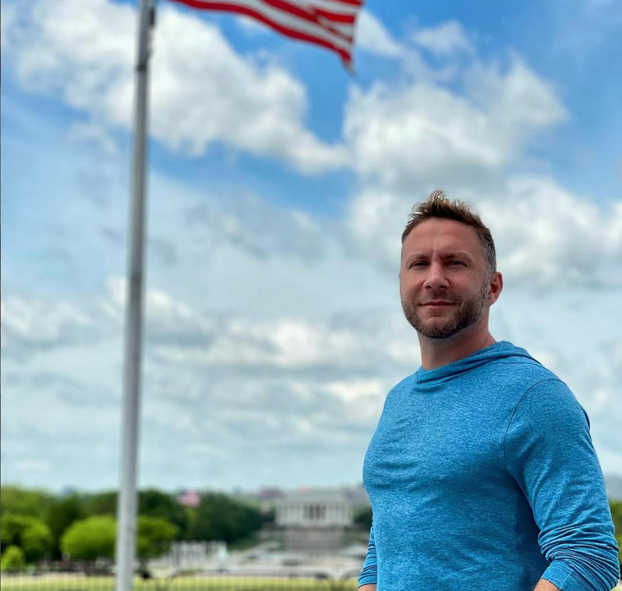 Serhat Gumrukcu poses in Washington, with the U.S. Capitol visible in the background, Washington, United States, May 5, 2021. (Photo via Instagram / @docserhat)