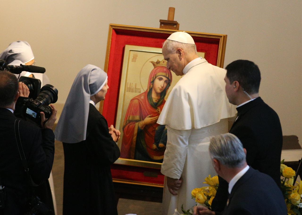 Pope Leo XIV speaks with nuns during his visit to French Poorhouse Nursing Home in Istanbul, Türkiye on Nov. 28, 2025. (AA Photo)