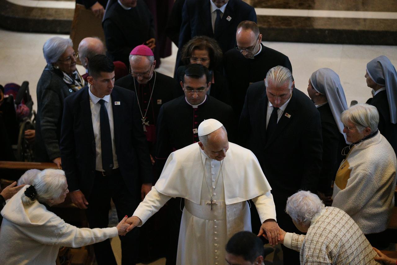 Pope Leo XIV greets elderlies during his visit to French Poorhouse Nursing Home in Istanbul, Türkiye on Nov. 28, 2025. (AA Photo)