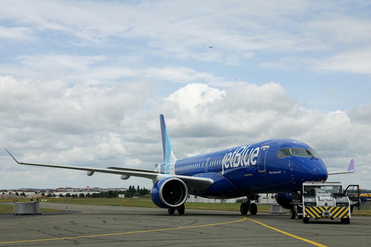 This photograph shows a Jetblue - AIRBUS A220-300 aircraft displayed during the 55th edition of the International Paris Air Show (Salon international de l'aeronautique et de l'espace - SIAE) at the Paris–Le Bourget Airport, in Le Bourget, suburb of Paris on June 15, 2025. (AFP File Photo)