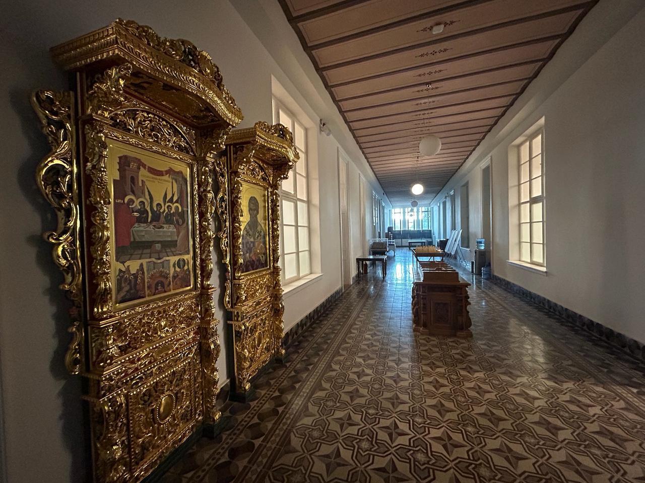 A restored corridor inside the Halki Seminary features gilded Orthodox icons and patterned floor tiles reflecting 19th-century Byzantine-inspired design, Oct. 25, 2025. (Photo by Koray Erdogan/Türkiye Today)
