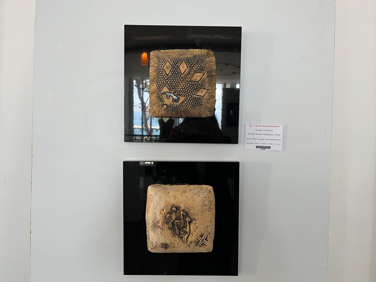 Ceramic panels from Selma Gencel’s Ancient Traces Gobeklitepe series on display at the Bulent Ecevit Cultural Center during the Antalya Culture Route Festival, Türkiye, Nov. 2, 2025. (AA Photo)