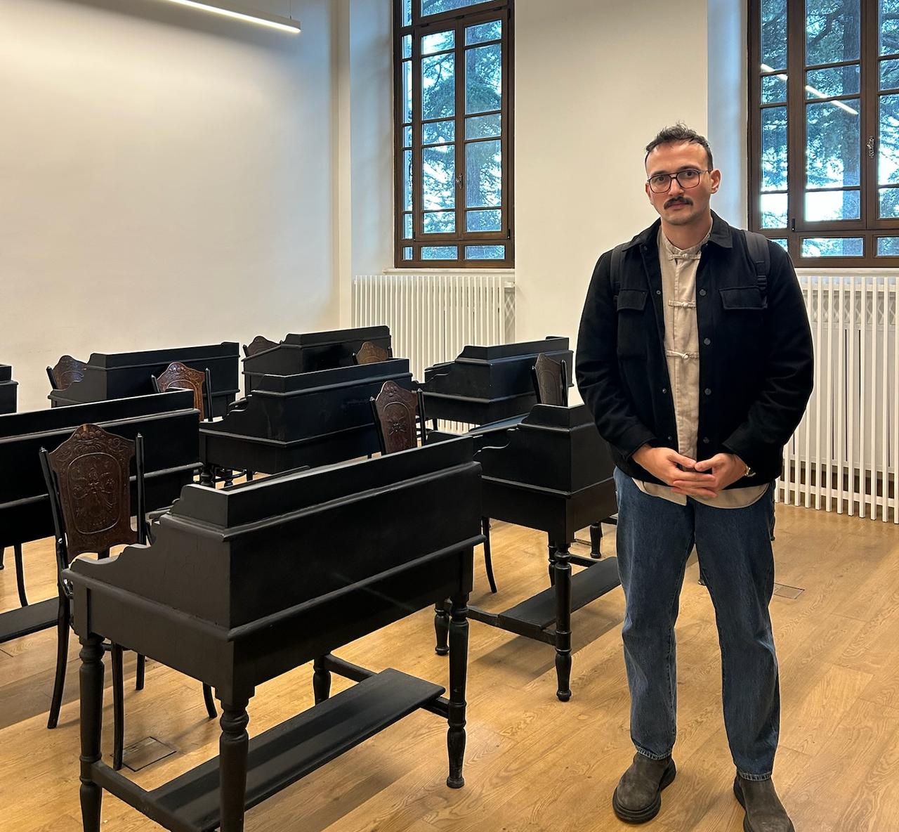 Koray Erdogan inside one of the restored classrooms of the Halki Seminary, where students once studied theology before the school’s closure in 1971, Oct. 25, 2025. (Photo by Koray Erdogan/Türkiye Today)