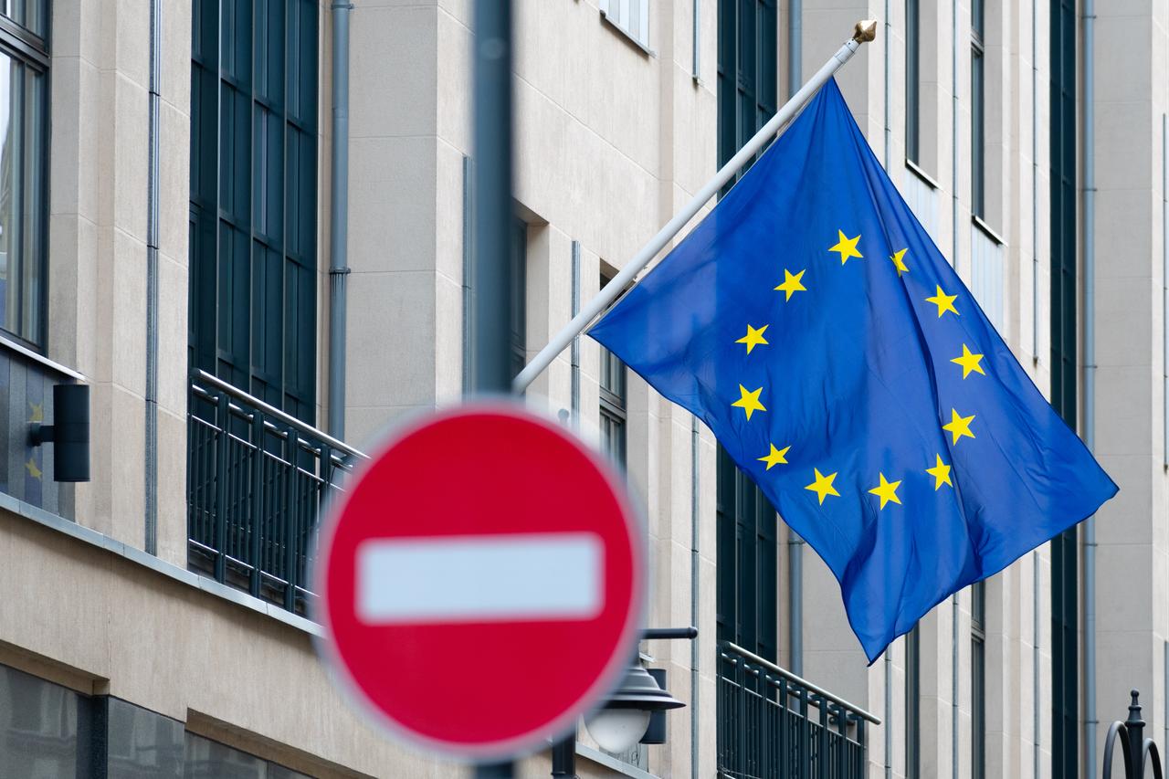 A European Union flag alongside a “no entry” sign. (Adobe Stock Photo)