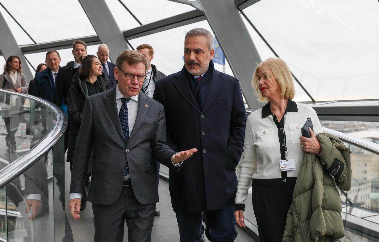 Turkish Foreign Minister Hakan Fidan (C) visits the German Federal Parliament building during his official visit along with his German counterpart Johann David Wadephul (L) in Berlin, Germany on Nov. 28, 2025. (Turkish Foreign Ministry HO / AA Photo)