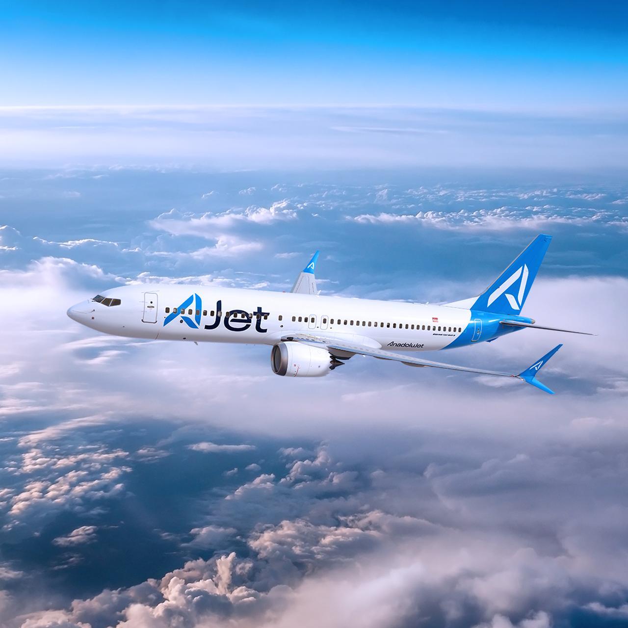 Promotional photo shows an AJet aircraft flying above the clouds. (Courtesy of AJet)