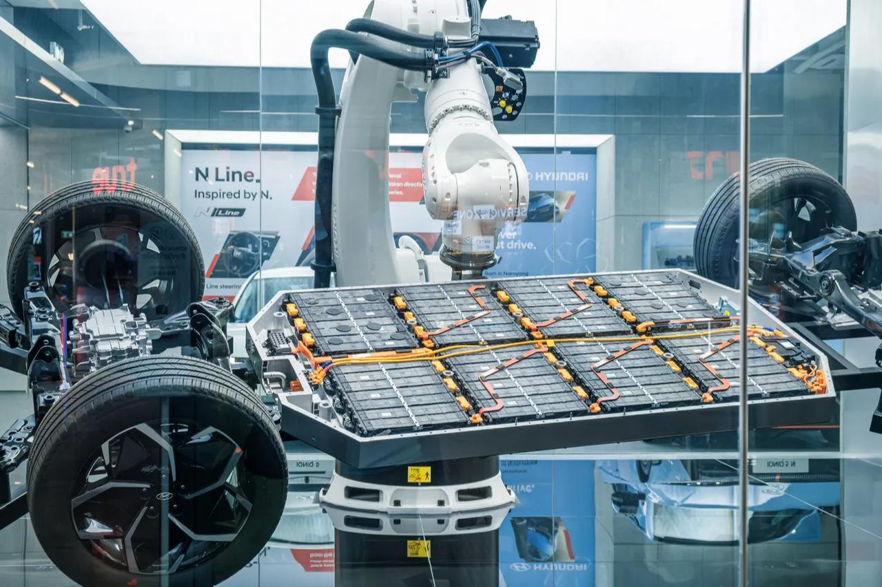 High-tech automotive manufacturing display featuring robotic arms assembling a lithium-ion EV battery pack in Bangkok, Thailand, Feb. 21, 2025. (Adobe Stock Photo)