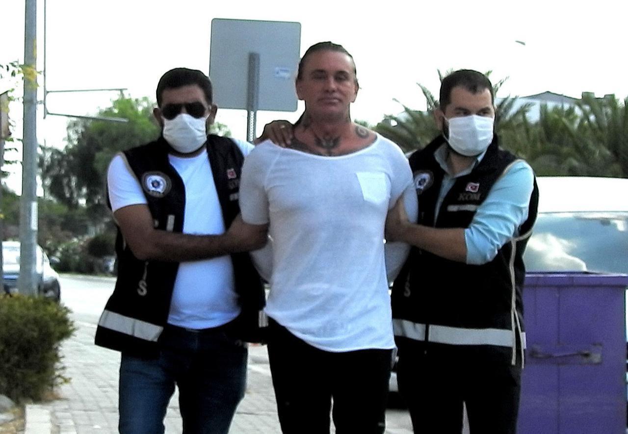 Hells Angels ringleader Coskun Necati Arabaci detained in Izmir, Türkiye, Oct. 5, 2025. (IHA Photo)